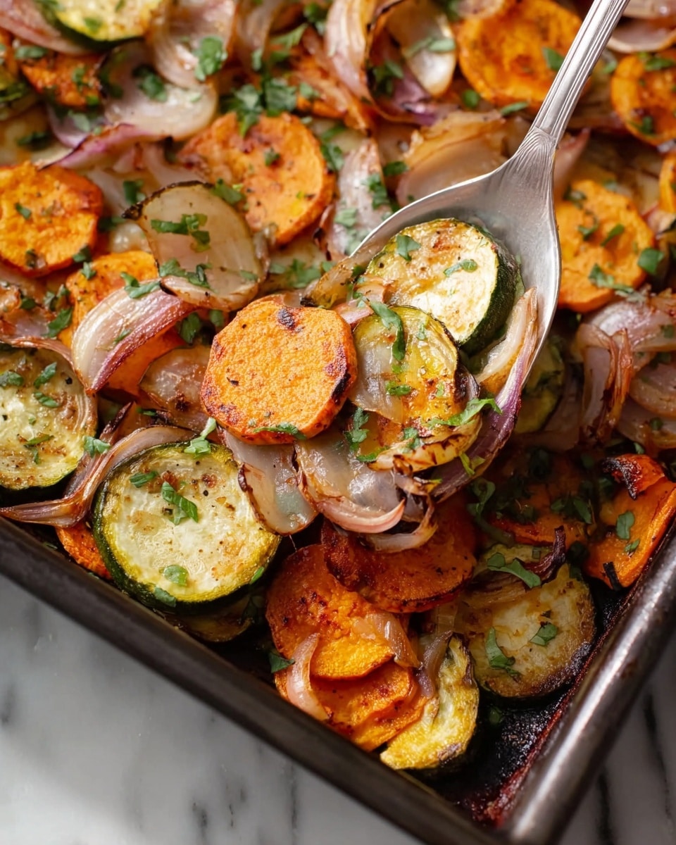 This image shows a close-up of a baked vegetable dish with thin slices of orange sweet potatoes, light green zucchini rounds, and pale purple onion strips, all mixed and cooked together in a dark baking pan. The vegetables are slightly browned and crispy on the edges, with bright green chopped herbs sprinkled on top. A silver spoon is scooping some of the vegetables from the pan, lifting the mix to show the different textures and colors against a white marbled surface. photo taken with an iphone --ar 4:5 --v 7