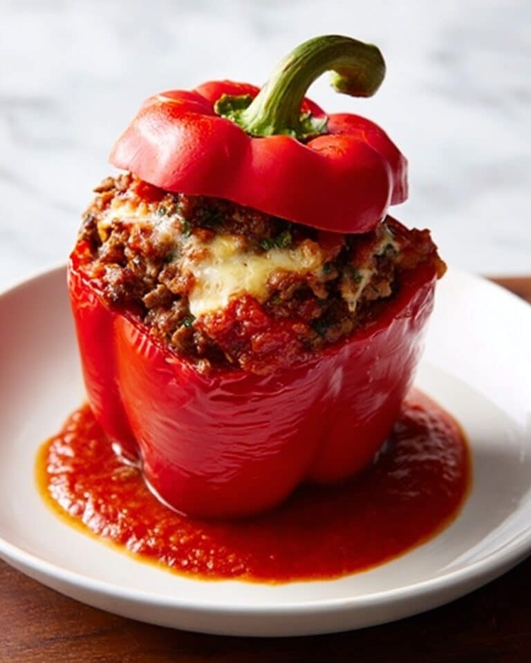 Slow Cooker Sausage, Potato, and Onion-Stuffed Peppers Recipe