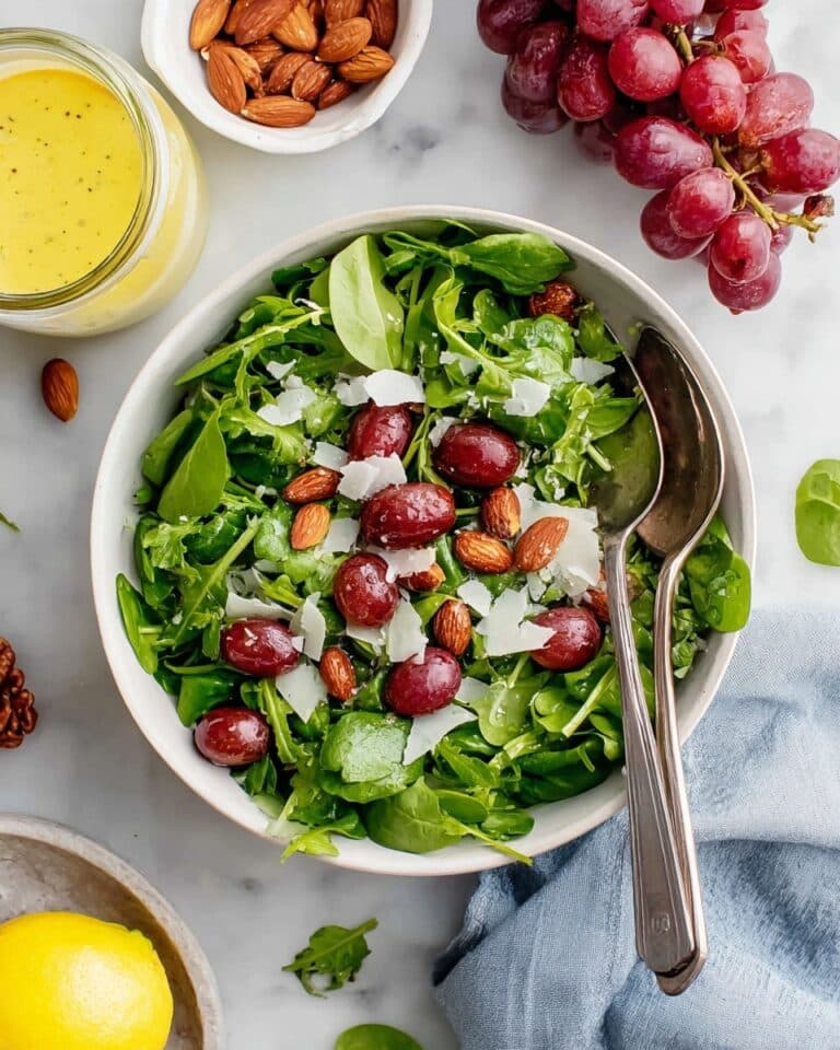 Arugula Salad with Roasted Almonds, Grapes, and Lemon Vinaigrette Recipe